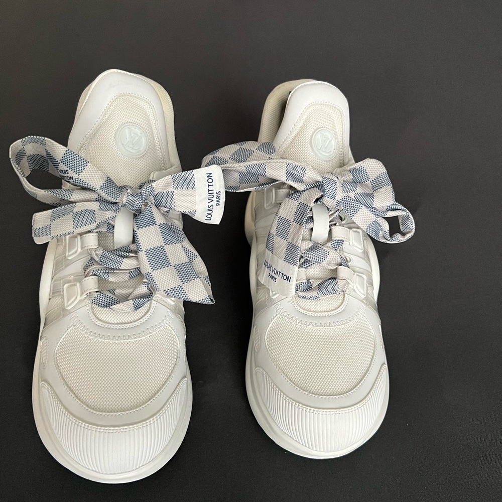 LV sneakers never worn they are size 41 for more like a 9.5